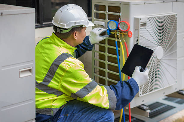 Professional Air Duct Cleaning technician working in Highland Park, TX